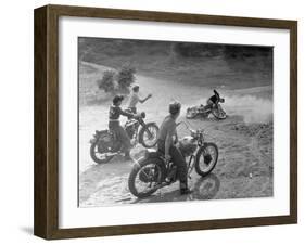 Riders Enjoying Motorcycle Riding, with One Taking a Spill-Loomis Dean-Framed Photographic Print