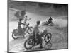 Riders Enjoying Motorcycle Riding, with One Taking a Spill-Loomis Dean-Mounted Photographic Print