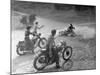 Riders Enjoying Motorcycle Riding, with One Taking a Spill-Loomis Dean-Mounted Photographic Print