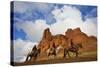 Riders Passing under the Red Rock Hills of the Big Horn Mountains-Terry Eggers-Stretched Canvas