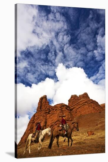 Riders Passing under the Red Rock Hills of the Big Horn Mountains-Terry Eggers-Stretched Canvas