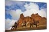 Riders Passing under the Red Rock Hills of the Big Horn Mountains-Terry Eggers-Mounted Photographic Print