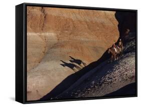 Riders with Shadow Coming down Hill in Painted Desert-Terry Eggers-Framed Stretched Canvas