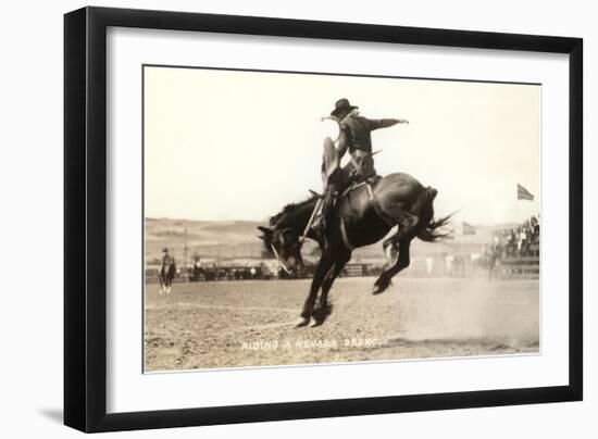 Riding a Nevada Bronco-null-Framed Art Print