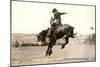 Riding a Nevada Bronco-null-Mounted Art Print