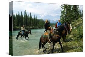 Riding in Banff National Park, Alberta, Canada-null-Stretched Canvas