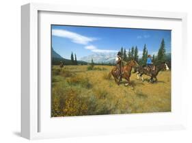 Riding in Banff National Park, Alberta, Canada-null-Framed Art Print