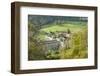 Rievaulx Abbey and remote village near Helmsley in North Yorkshire, England, United Kingdom, Europe-John Potter-Framed Photographic Print