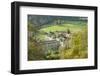 Rievaulx Abbey and remote village near Helmsley in North Yorkshire, England, United Kingdom, Europe-John Potter-Framed Photographic Print