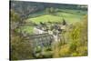 Rievaulx Abbey and remote village near Helmsley in North Yorkshire, England, United Kingdom, Europe-John Potter-Stretched Canvas