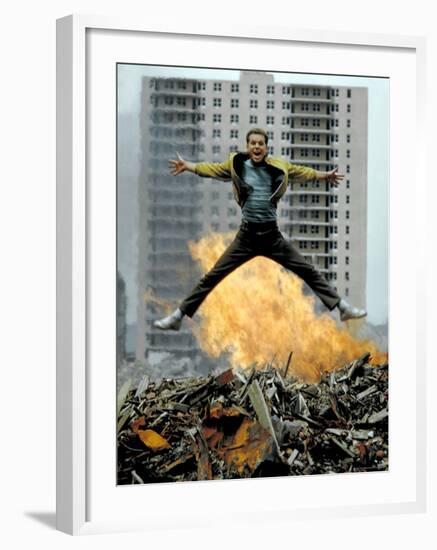 Riff Leaps over Smoldering Rubble of New York Slum Clearance Project in Scene from West Side Story-Gjon Mili-Framed Premium Photographic Print