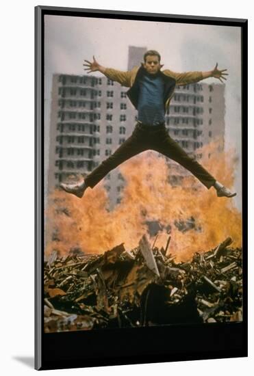 Riff Leaps over Smoldering Rubble of New York Slum Clearance Project in Scene from West Side Story-Gjon Mili-Mounted Photographic Print