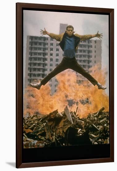 Riff Leaps over Smoldering Rubble of New York Slum Clearance Project in Scene from West Side Story-Gjon Mili-Framed Photographic Print