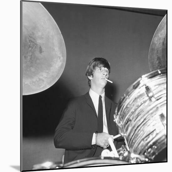 Ringo Starr Playing the Drums-Associated Newspapers-Mounted Photo