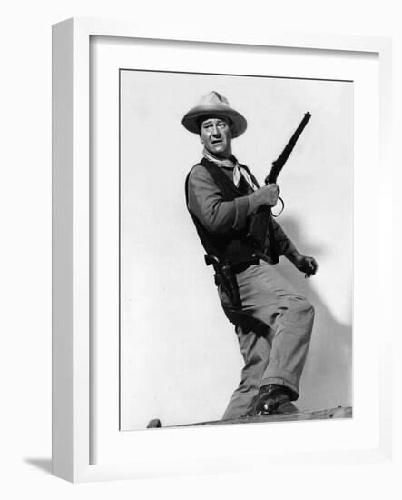 RIO BRAVO, 1959 directed by HOWARD HAWKS John Wayne (b/w photo)-null-Framed Photo