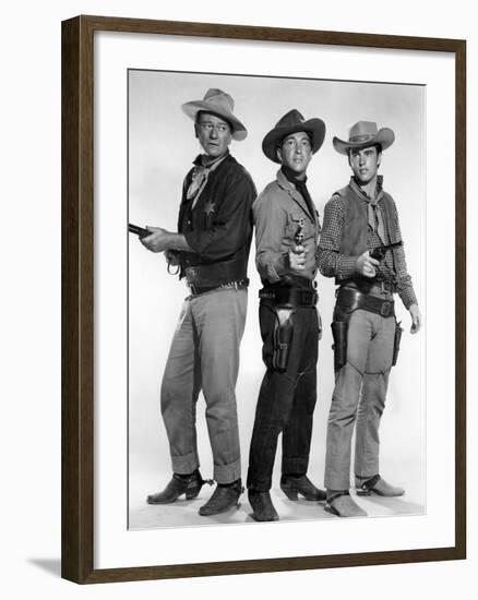 RIO BRAVO, 1959 directed by HOWARD HAWKS John Wayne, Dean Martin and Ricky Nelson (b/w photo)-null-Framed Photo