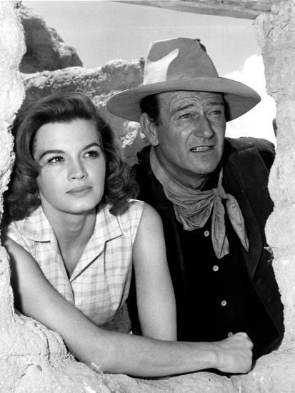 RIO BRAVO, 1959 directed by HOWARD HAWKS On the set, Angie Dickinson and John  Wayne (b/w photo)&#39; Photo | AllPosters.com