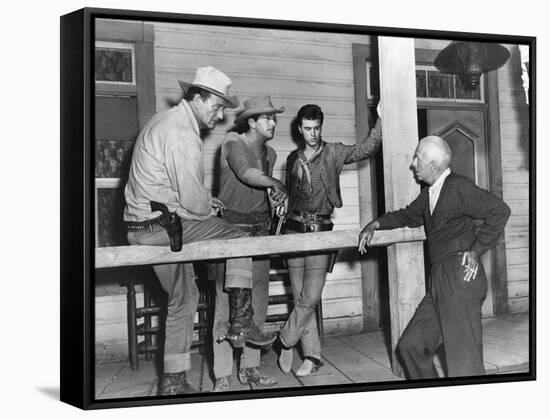 RIO BRAVO, 1959 directed by HOWARD HAWKS On the set, John Wayne, Dean Martin and Ricky Nelson with -null-Framed Stretched Canvas