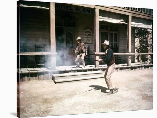 RIO BRAVO, 1959 directed by HOWARD HAWKS Ricky Nelson and John Wayne (photo)-null-Stretched Canvas