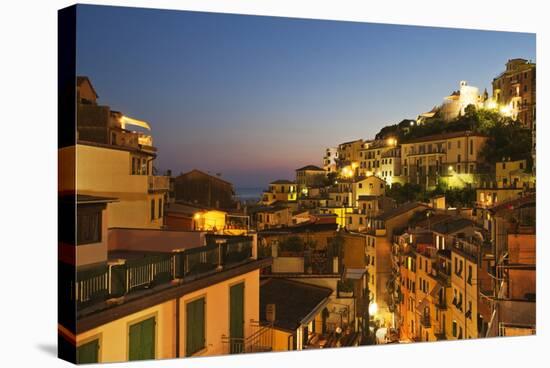 Riomaggiore Rooftops and the Castle at Dusk-Mark Sunderland-Stretched Canvas
