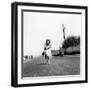 Rita Giannuzzi Poses Smiling on the Road Observed by a Man Passing on a Motorbike-null-Framed Photographic Print