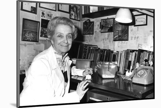 Rita Levi-Montalcini Sitting at a Desk-null-Mounted Photographic Print