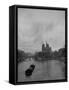 River Barge Churning up the Seine Past Notre Dame Cathedral on a Gloomy Winter Day-Ed Clark-Framed Stretched Canvas