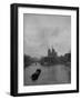 River Barge Churning up the Seine Past Notre Dame Cathedral on a Gloomy Winter Day-Ed Clark-Framed Photographic Print
