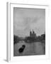 River Barge Churning up the Seine Past Notre Dame Cathedral on a Gloomy Winter Day-Ed Clark-Framed Photographic Print