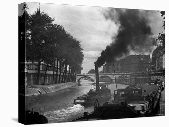 River Boat Smoke Passes along the River Seine-Andreas Feininger-Stretched Canvas