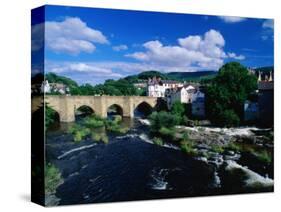 River Dee Flowing Under Bridge Through Town, Llangollen, United Kingdom-Anders Blomqvist-Stretched Canvas