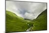 River Flowing through a Valley in the Scottish Highlands, the Mountains are Covered in Clouds-unkreatives-Mounted Photographic Print