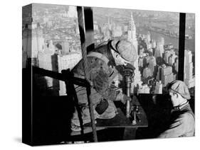 Riveters on the Empire State Building, 1930-31 (gelatin silver print)-Lewis Wickes Hine-Stretched Canvas