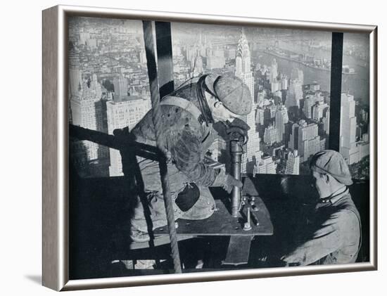 'Rivetting the last bolts on The Morning Mast of the Empire State building', c1931-Lewis Wickes Hine-Framed Photographic Print