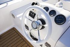 Instrument Panel and Steering Wheel at a Motor Boat Cockpit (Yacht Control Bridge)-rjmiguel-Framed Stretched Canvas