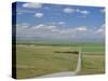 Road Across Prairie Wheatlands, South of Calgary, Alberta, Canada-Anthony Waltham-Stretched Canvas