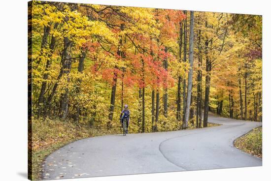 Road Bicycling in Autumn at Brown County State Park, Indiana, USA-Chuck Haney-Stretched Canvas