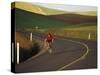 Road Bicycling in the Palouse Country Near Pullman, Washington, USA-Chuck Haney-Stretched Canvas