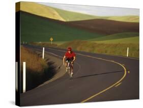 Road Bicycling in the Palouse Country Near Pullman, Washington, USA-Chuck Haney-Stretched Canvas