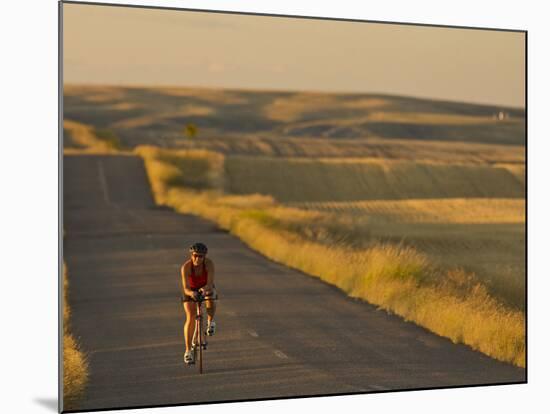 Road Bicycling Near Great Falls, Montana, Usa-Chuck Haney-Mounted Photographic Print