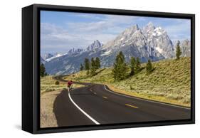 Road Biking in Grand Teton National Park, Wyoming, USA-Chuck Haney-Framed Stretched Canvas