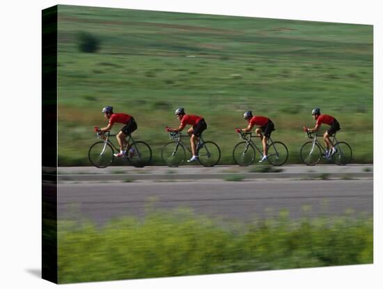 Road Cycling Team in Action-null-Stretched Canvas