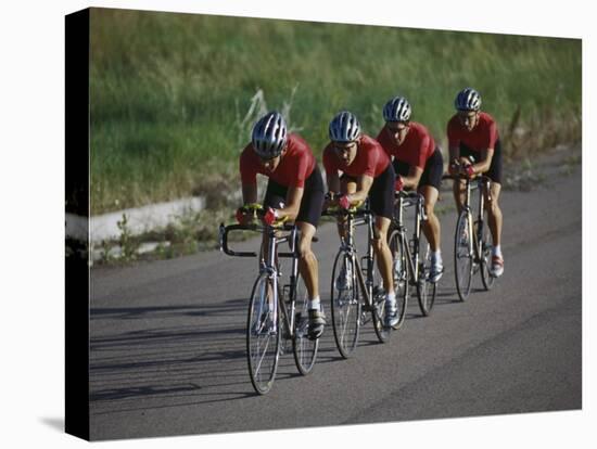 Road Cycling Team in Action-null-Stretched Canvas