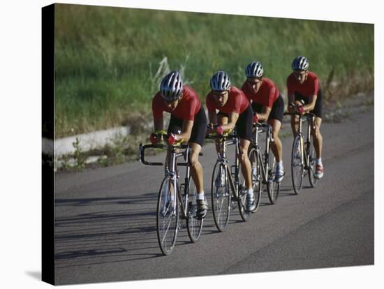 Road Cycling Team in Action-null-Stretched Canvas