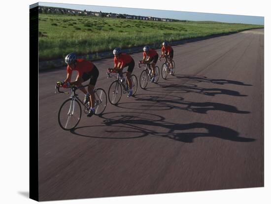 Road Cycling Team in Action-null-Stretched Canvas