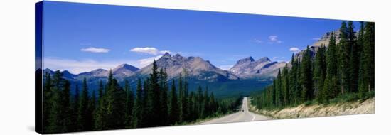 Road in Canadian Rockies, Alberta, Canada-null-Stretched Canvas