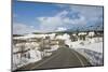 Road leading through the snow capped mountains of the Daisetsuzan National Park, UNESCO World Herit-Michael Runkel-Mounted Photographic Print