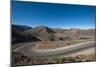 Road leading towards the Salinas Grandes (salt flats) near Purmamarca, Argentina, South America-Alex Treadway-Mounted Photographic Print