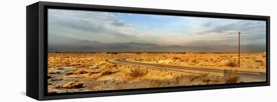 Road passing through desert, Palm Springs, Riverside County, California, USA-Panoramic Images-Framed Stretched Canvas