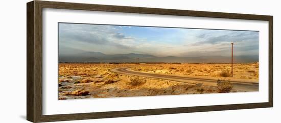Road passing through desert, Palm Springs, Riverside County, California, USA-Panoramic Images-Framed Photographic Print